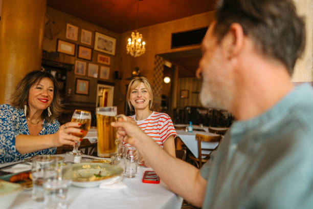 istock Group of friends on a brunch in a restaurant 1725468670