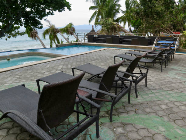 istock Empty sun loungers by the pool. 1725473538