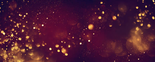 istock Golden abstract bokeh on black background. 1725500043