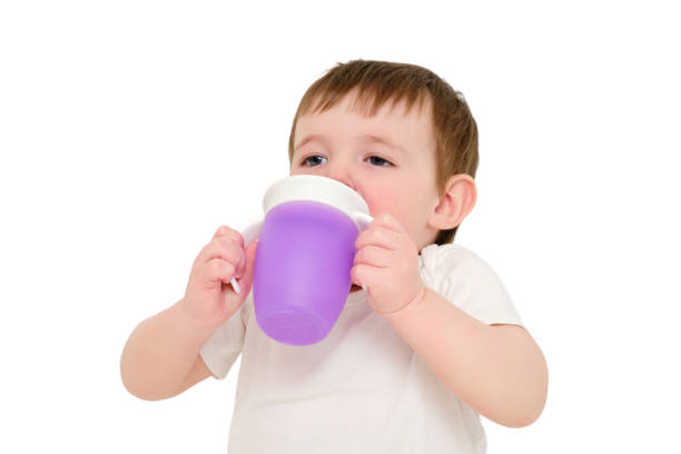 Close-Up Of Boy Drinking Water