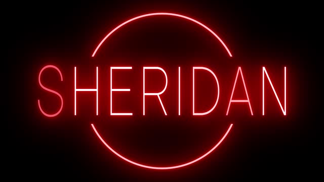 Glowing and blinking red retro neon sign for SHERIDAN