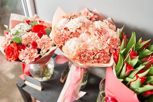 Ready-made bouquets for sale. Many different flowers on Showcase. Background of mix of flowers. Beautiful flowers for catalog or online store. Floral shop and delivery concept. High quality photo