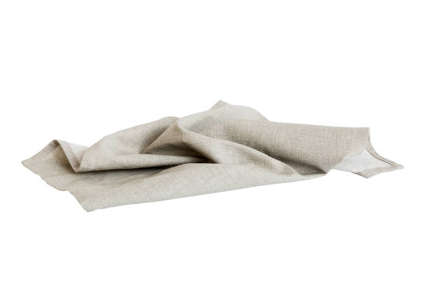 istock Grey textile napkin isolated on white background. Folded decorative kitchen cotton towel. Top view 1725605145