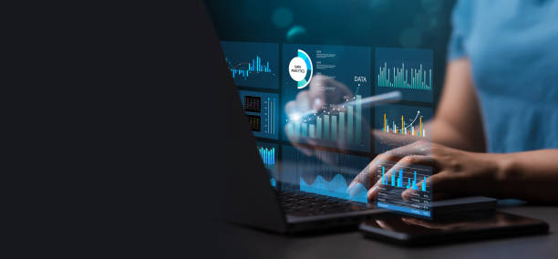 istock Female analyst uses Work on laptop and dashboard for business analysis, data and data management system with KPIs and indicators connected to database for technology finance. Corporate strategy for finance, sales, marketing 1725611793