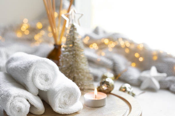 Christmas spa composition on a blurred background with bokeh lights. stock photo