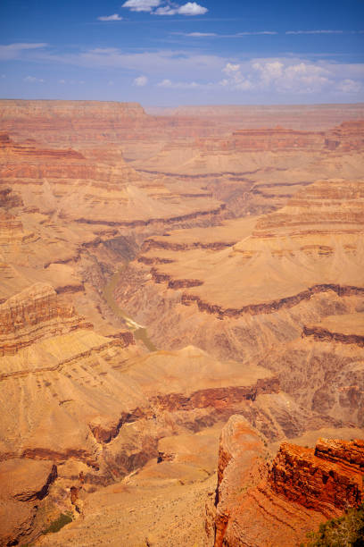 A beautiful view of the Grand Canyon National Park in summer. Red rock and blue sky.