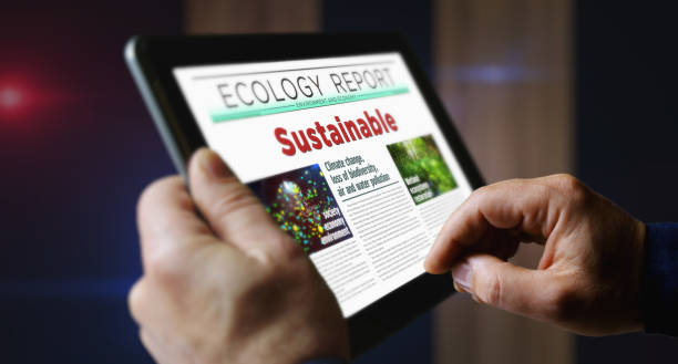 istock Sustainable green eco industry newspaper on mobile tablet screen 1725636112