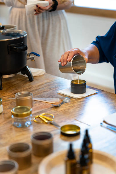 istock Soy candle workshop. Liquid soy wax. Candle making. 1725645597