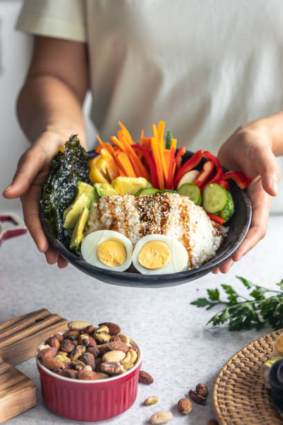 istock Homemade bowl with rice, vegetables and eggs. 1725650273