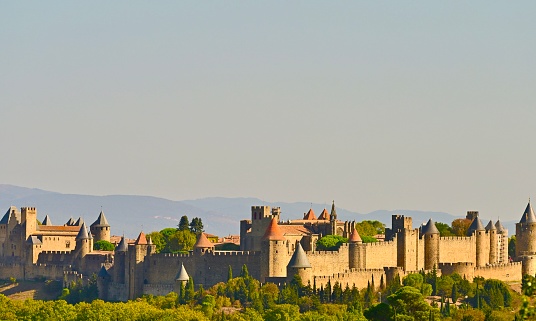 The Cite de Carcassonne, is a hilltop medieval walled city in southern France’s Languedoc region. It is famous for the many watchtowers and double-walls surrounding the buildings.
