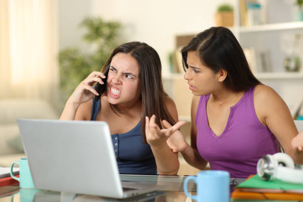 istock Angry students claiming on phone at home 1725685001
