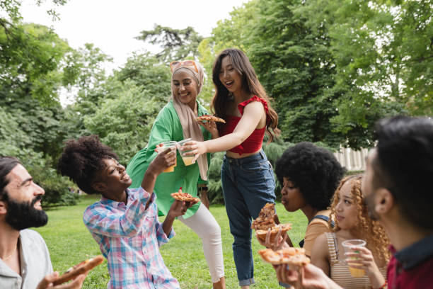 istock diverse multiethnic women having fun together at picnic party 1725699089