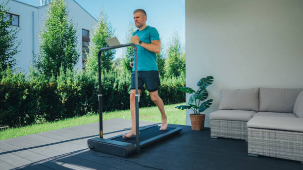 istock Man running on a treadmill at the yard 1725701951