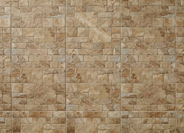 istock Large brown stoneware tiles with stone effect for outdoors or interior wall. 1725718377
