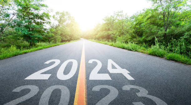 istock New year number 2023 and 2024 on empty asphalt road 1725732198