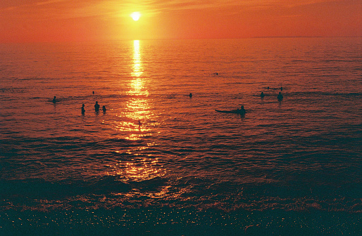 Swimmer on a Devon beach at sunset, 35mm film.