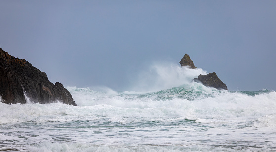 Church Rock on the coast of Broad Haven south Pembrokeshire Wales with storm Agnes