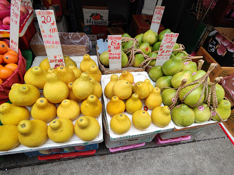 Stall sellling tropical fruit on the busy fruit and vegetables market in Canton road, Mongkok district, Kowloon peninsula.