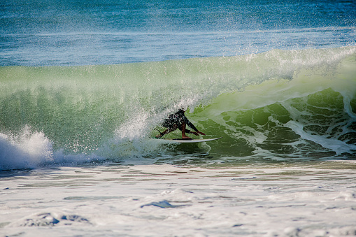 surfer in action in big waves