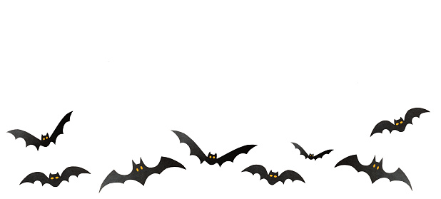 Bats isolated on white background. Halloween decorations, paper bats. Halloween party greeting card mockup with copy space. Happy halloween holiday concept.