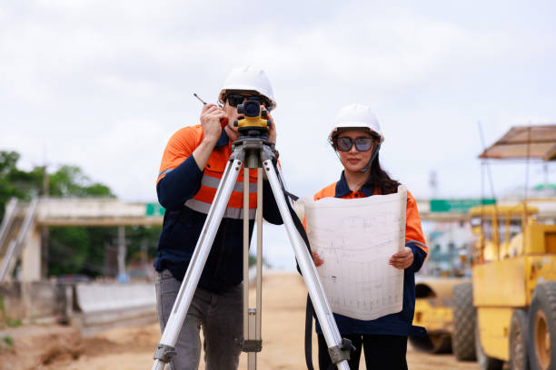 istock Engineer use theodolite equipment for route surveying to build a bridge 1725815342