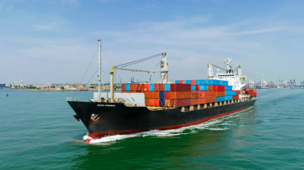 istock container cargo ship import export global business and industry commercial trade logistic and transportation of international by container cargo ship in sea, container cargo freight shipping, front view 1725820369