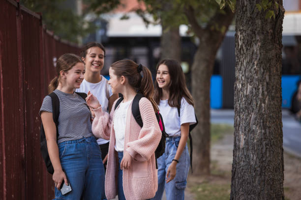 istock Girls having fun on their way to school 1725830326
