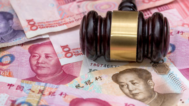 istock yuan on wooden hammer . close up. 1725861733