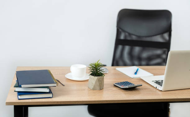 istock Workplace with notepad pen calculator laptop, coffee and keyboard 1725865196