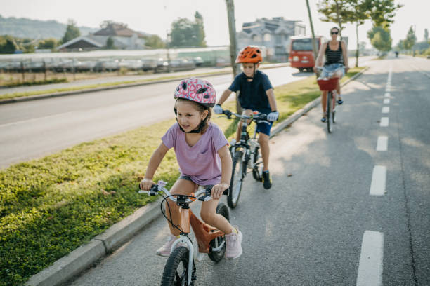 istock Family riding bicycles together 1725867433
