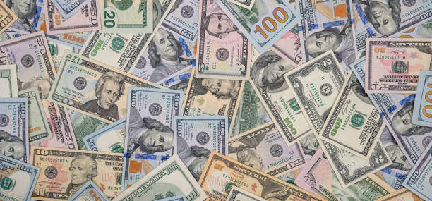 istock Lots of paper usd dollar bank notes as background 1725879575