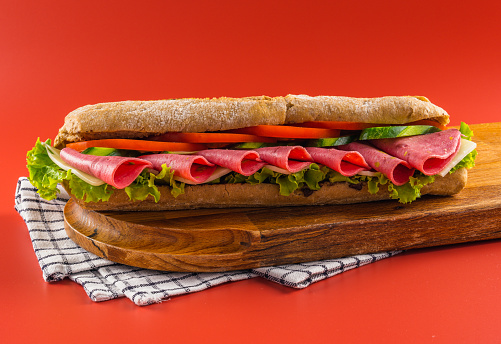 Salami sandwich, lettuce and cherry tomatoes