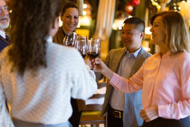 istock Business people having dinner in luxury restaurant 1725948656