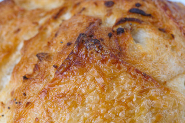 istock Abstract close-up of white bread background texture.Homemade bread surface. Beautiful crust of bread close-up. 1725959862
