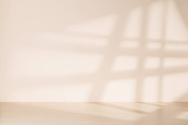 istock Wooden table and sunlit wall, product template 1725969059