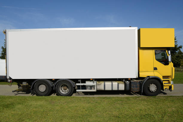 istock Large truck with yellow cabin and blank space on his side 1725977649