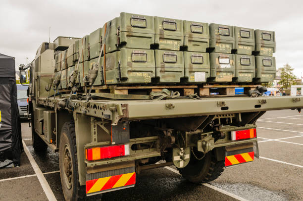 istock Boxes (inert) for anti-tank missiles on back of a flat-bed lorry. 1725992297