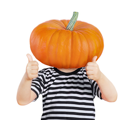 a humorous picture depicting a child with a pumpkin on his head for Halloween with a place for any emotions on his face. Highlighted on a white background.