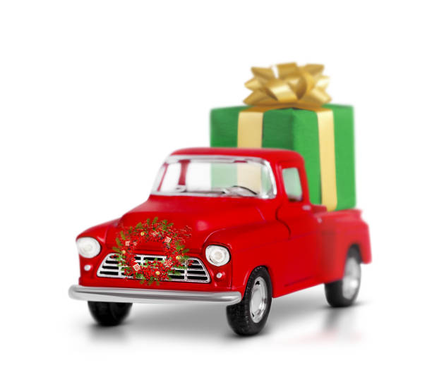 istock One red Christmas truck with a gift box is highlighted on a white background 1726008196