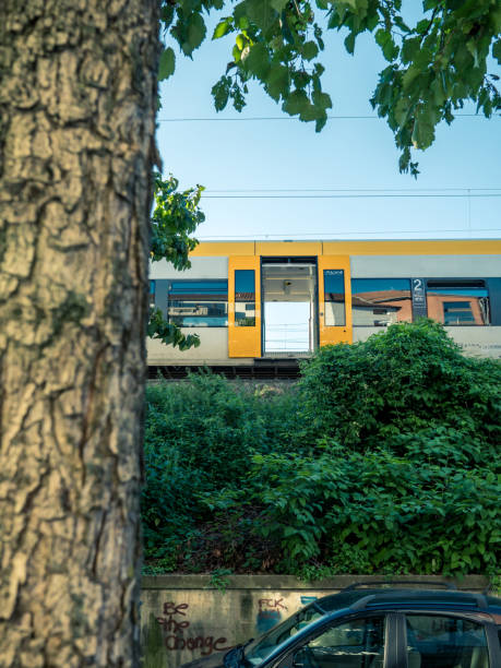istock An empty train stands waiting on the siding. Through the open doors you can see the blue sky through the train. 1726009273