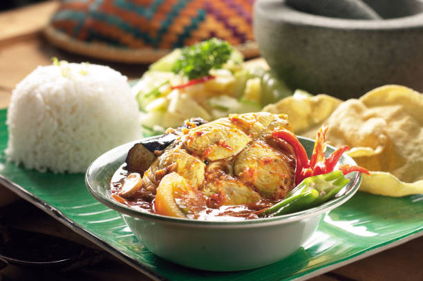 Traditional Indian dish of fish curry with okra and eggplant