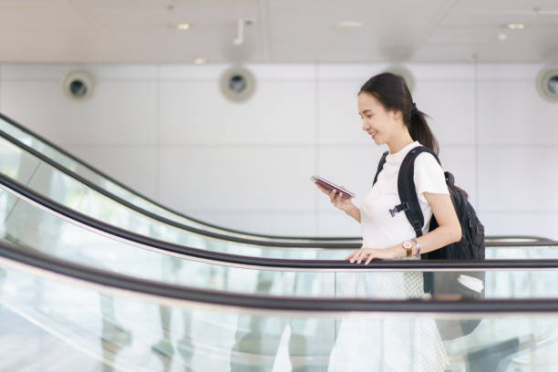 istock Woman passenger traveling and using technology. 1726021160