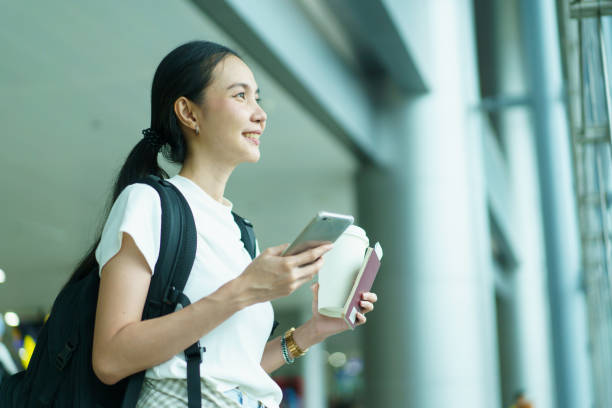 istock Woman passenger traveling and using technology. 1726021725