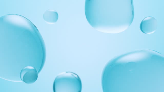 Cosmetic bubbles blue background with copy space