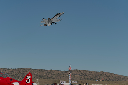 FA18 Super Hornet of the US Navy Tac Demo team taking off over the home pylon at the Reno Stead Airport