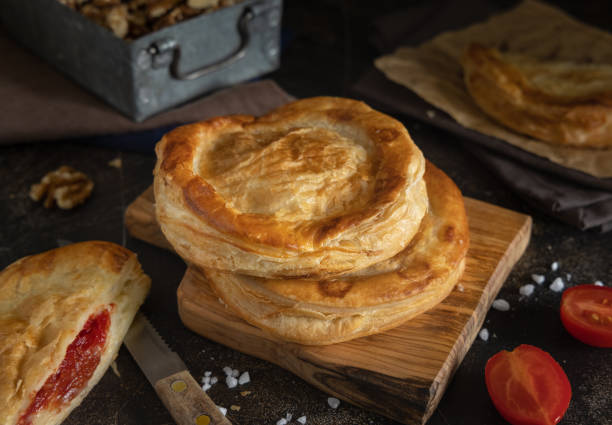 istock Rustico puff pastry from Lecce filled with stuffed with tomato, mozzarella and bechamel sauce 1726054190