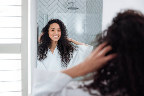 istock Bathroom Beauty: Woman in the Mirror 1726064238