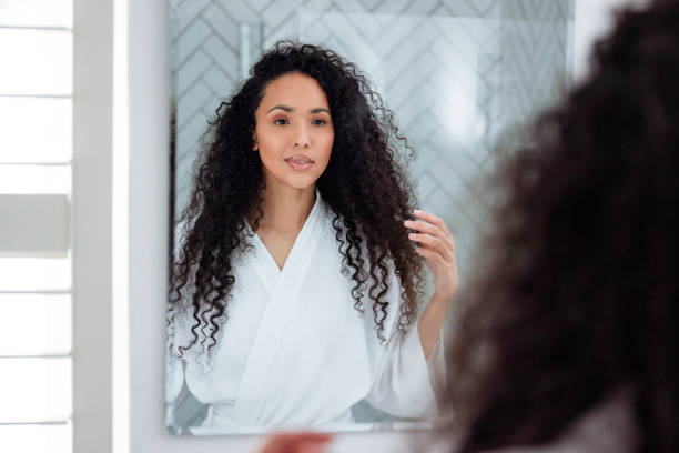 istock Bathroom Beauty: Woman in the Mirror 1726064253