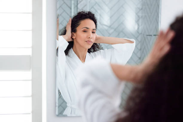 istock Bathroom Beauty: Woman in the Mirror 1726064823