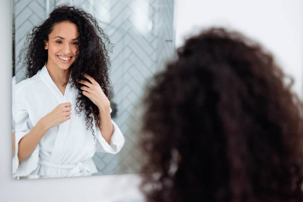 istock Bathroom Beauty: Woman in the Mirror 1726067048
